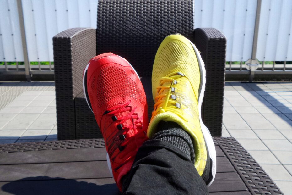 pair of red-and-yellow sneakers