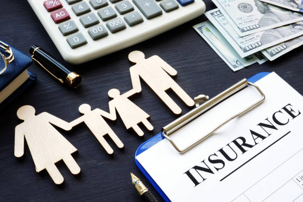 Life insurance. Policy and figures of family.